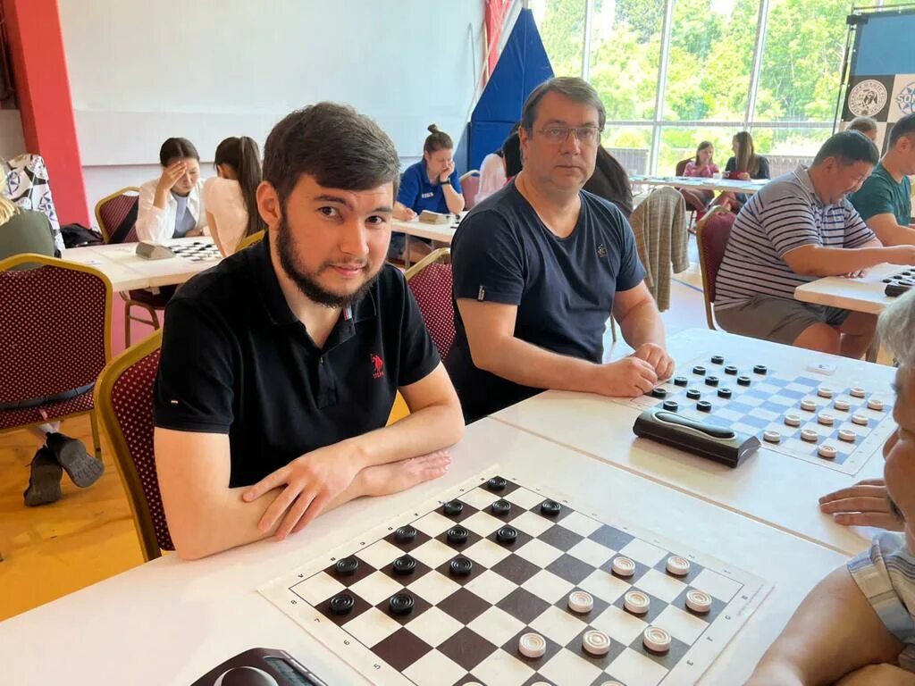 26 шашистов 3 из россии. Мажит Саршаев. Гроссмейстеры спортсмены. Draughts спорт. Кубок по шашкам.