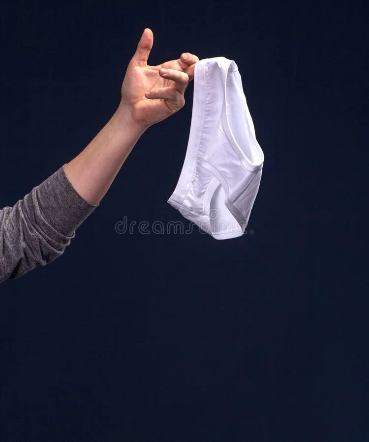 Holding panties. Женские трусы в руке. Женские трусики на прозрачном фоне. Период про трусы. Мода стринги.