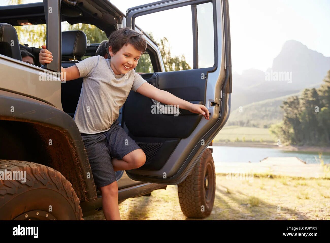 My friend not have a car. Ребенок выходит из машины. get out of the car. getting out of a car. get into a car.