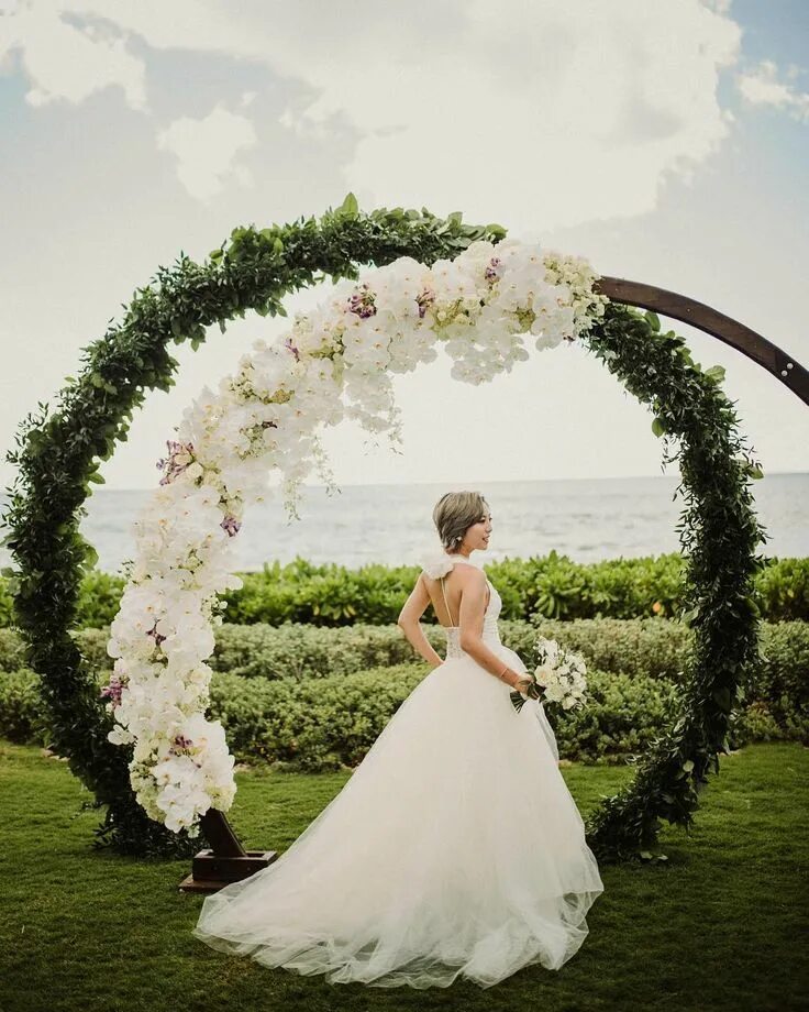 Stylish arch decorated in front. Wedding decorations, Outdoor wedding decoration