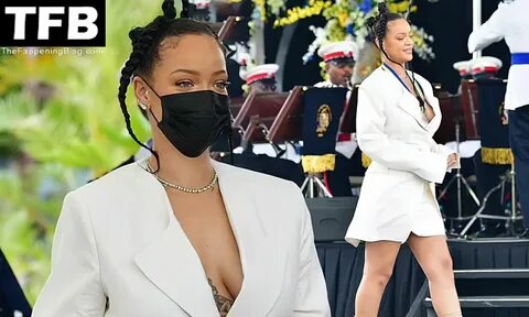 The Fappening Star Rihanna looks stunning in a plunging white mini dress an...