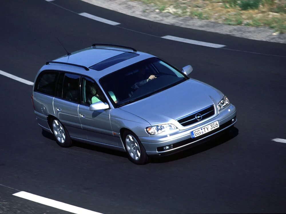 Универсал караван. Opel Omega 1999 универсал. Opel Omega Caravan 2003. Опель Омега b универсал. Opel Omega a Caravan.