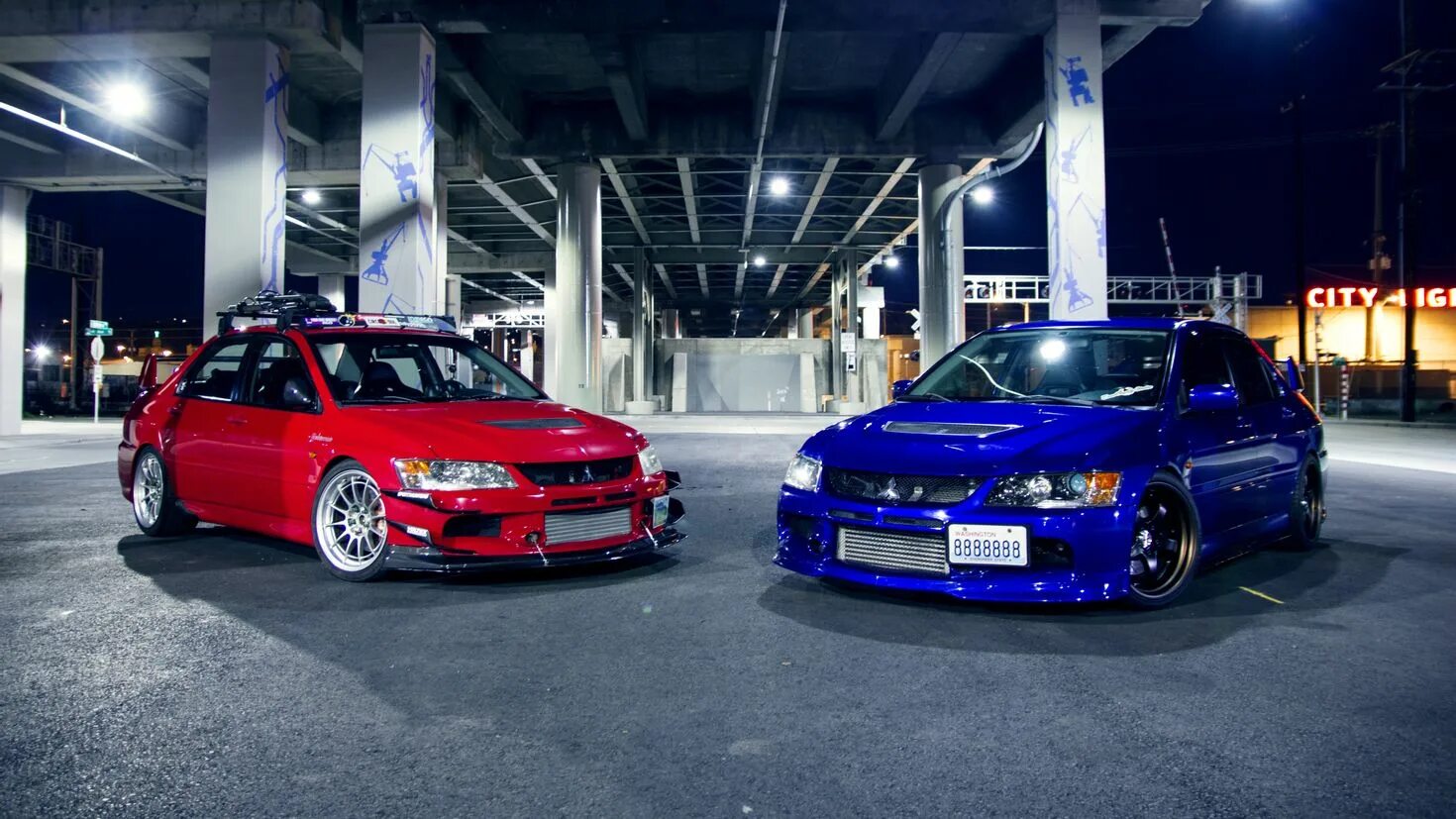 Развитие компьютеров. Лансер эво 9 оранжевый. Пк эволюшн. Mitsubishi evo 6 с неоном. Митсубиси лансер эволюшн 9.