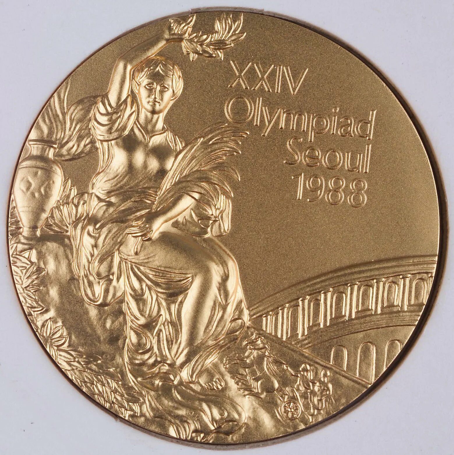 Золотые Олимпийские медали Сеул 1988. Олимпийская медаль Сеул 1988. Медаль олимпиады Сеул 1988 года.