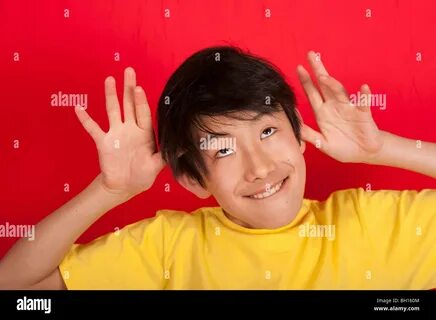 portrait of 13 year old Asian boy Stock Photo. 