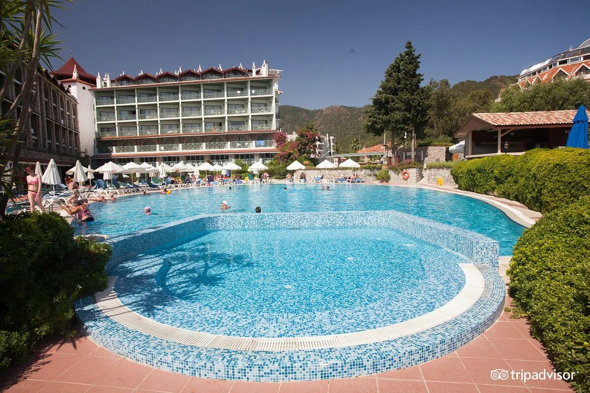 Fortuna beach hotel. Marti la Perla 4 Ичмелер. Отели Турции Marti la Perla 4 *. Marti la Perla Мармарис Ичмелер. Marti la Perla 5 Турция Мармарис.