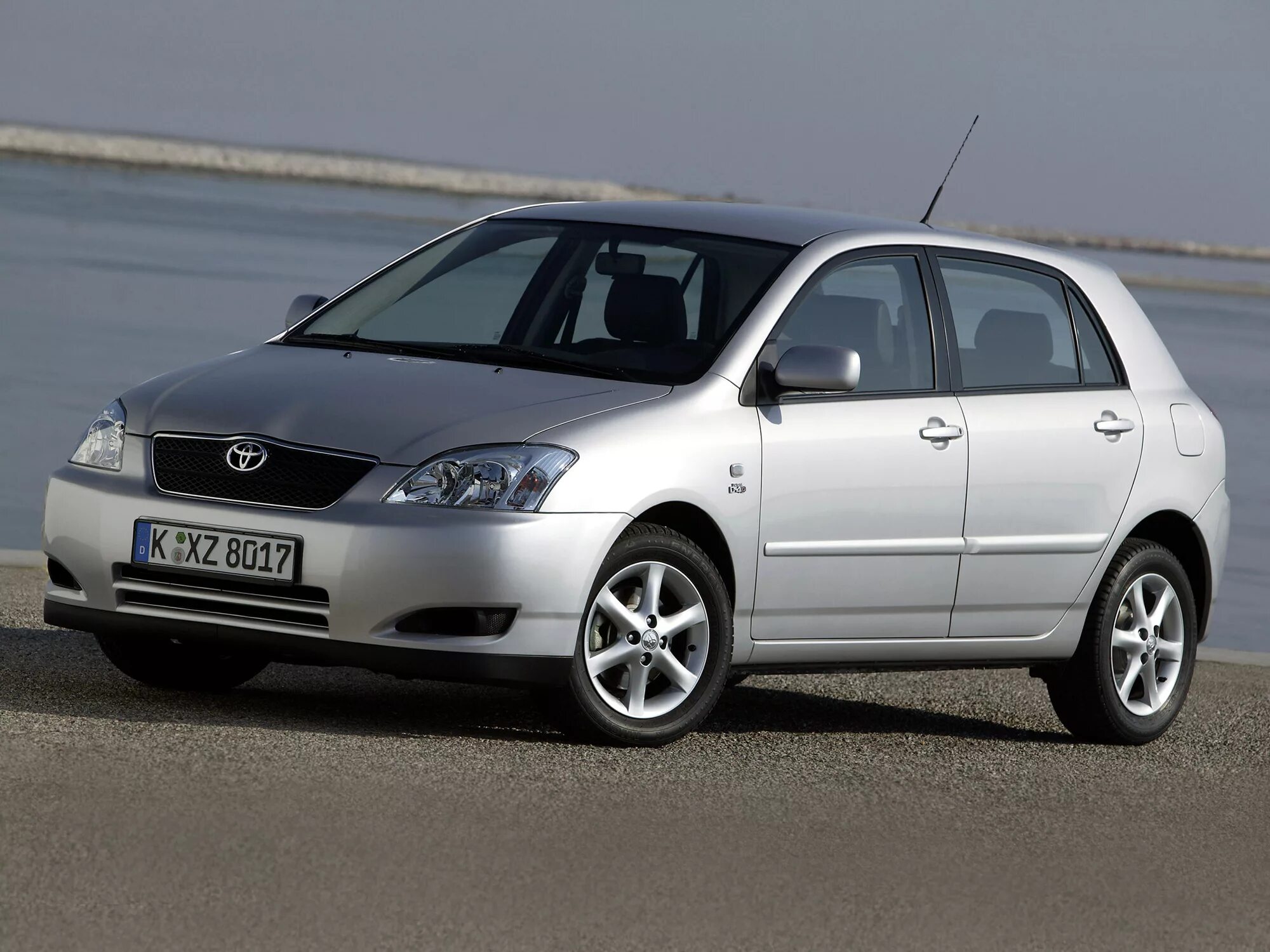 Тойоту 2006 хэтчбек. Тойота Королла 2003. Toyota Corolla 2003. Тойота Королла 2003 хэтчбек. Тойота каролла 2003 хэчбэк.