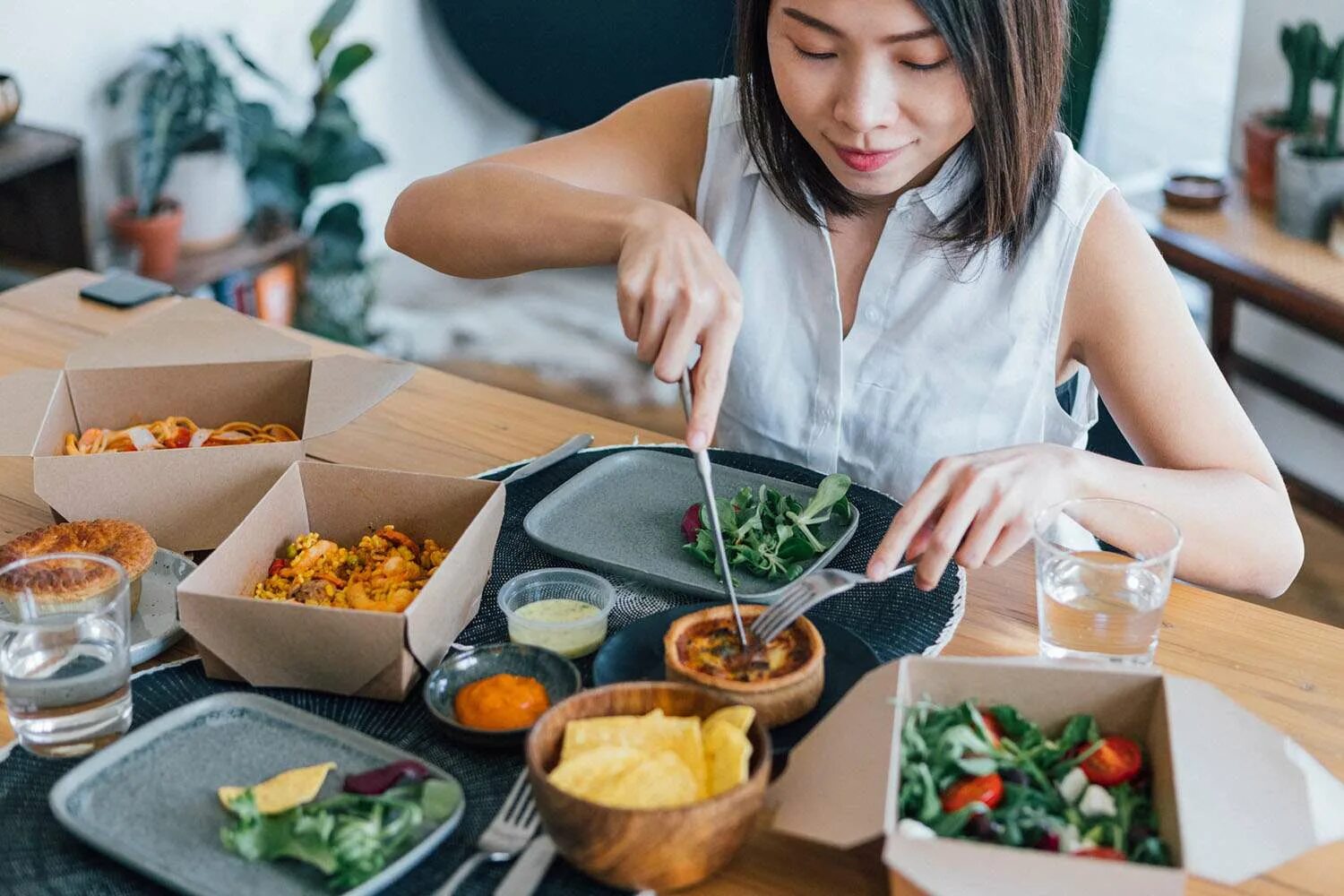 Delicious at Home. Takeaway delivery Costumer delicious. Asian woman eating 360. Eating out or eating at Home photos.