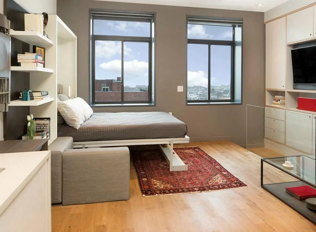 В комнате имеется мебель. Дизайн маленьких квартир. Дизайн однокомнатной квартиры. Расставить мебель в комнате. Интерьер небольшой квартиры.