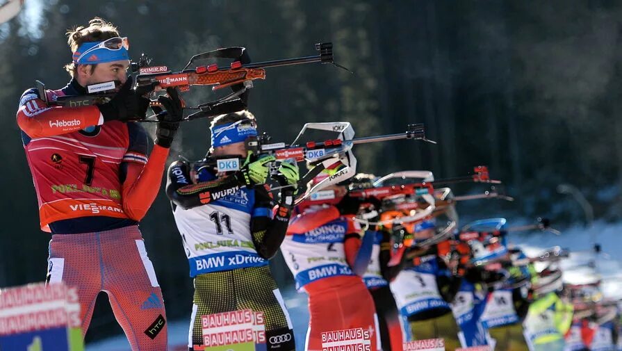 Mascot 1999 biathlon world championship. Спортсмен на лыжах. Соревнования по биатлону. В удмуртии соревнования по биатлону. Кулига парк тюмень.