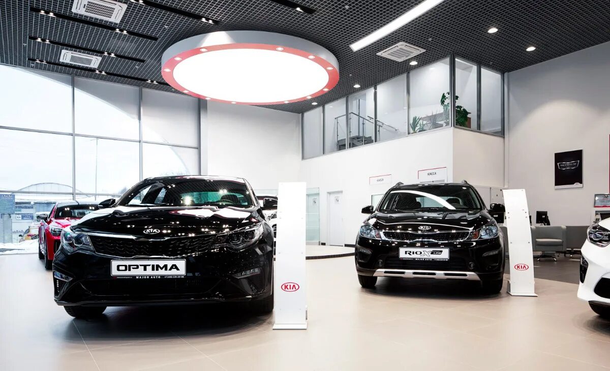 Салон киа телефон. New Kia Showroom. Kia шоурум. Киа новый дилерский центр. Шоурум Киа новый.