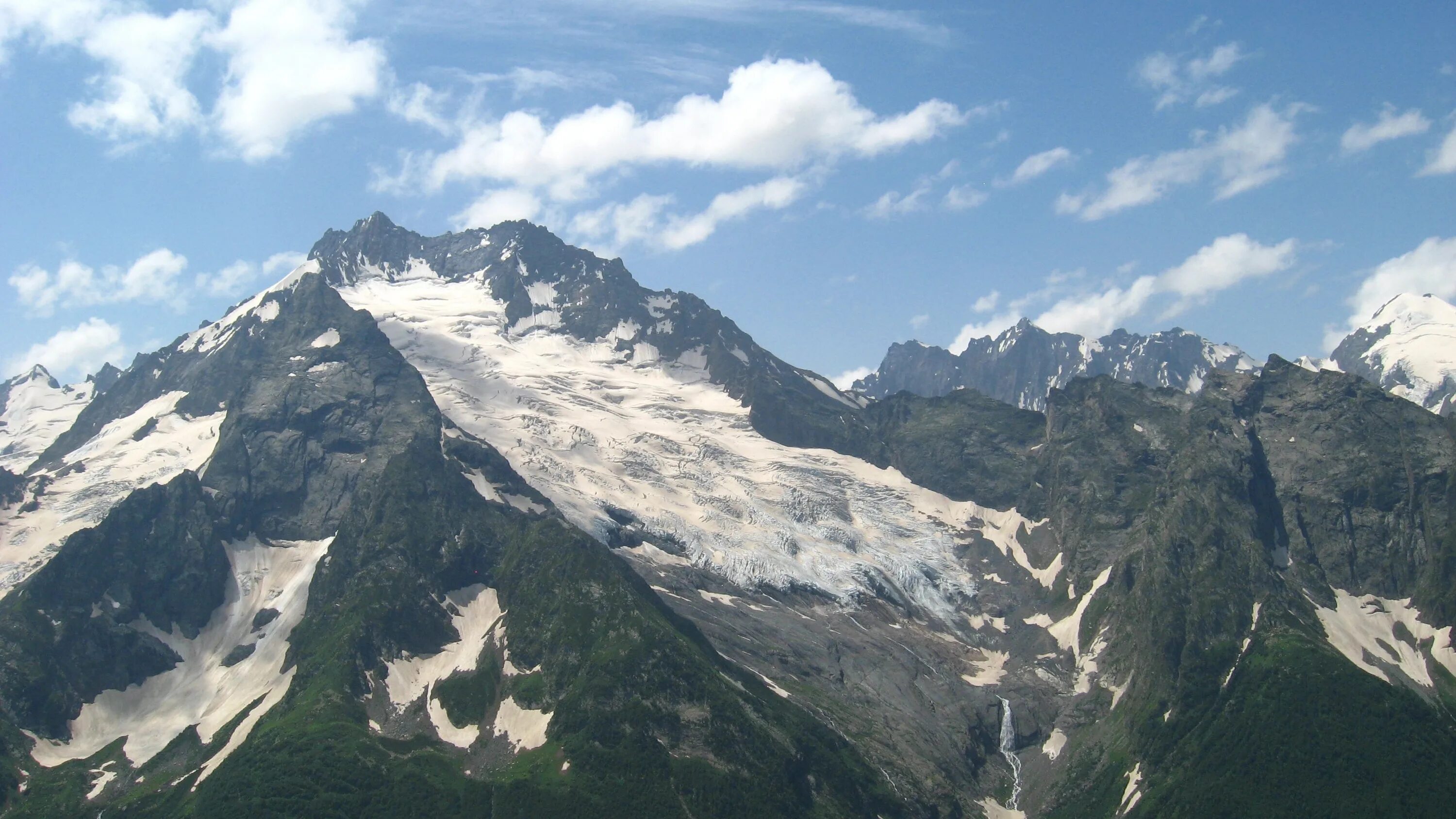 Горные вершины домбай. Горы кавказского хребта. Горы южного кавказа. Вершина северного кавказа. Домбай вершина горы.