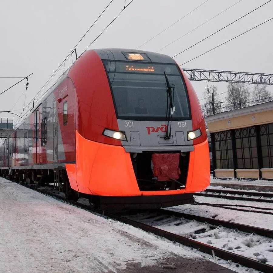 Жд ласточка санкт петербург. Ласточка поезд ржд. Ласточка эс1 премиум. Поезд ласточка санкт-петербург. Поезд ласточка финляндский вокзал.