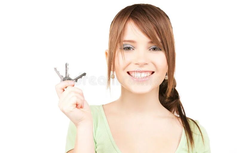 She looks for key. Ключи в руке девушки. She looks for key. Женщина с ключами от квартиры. Счастливая девушка с ключами в руках.