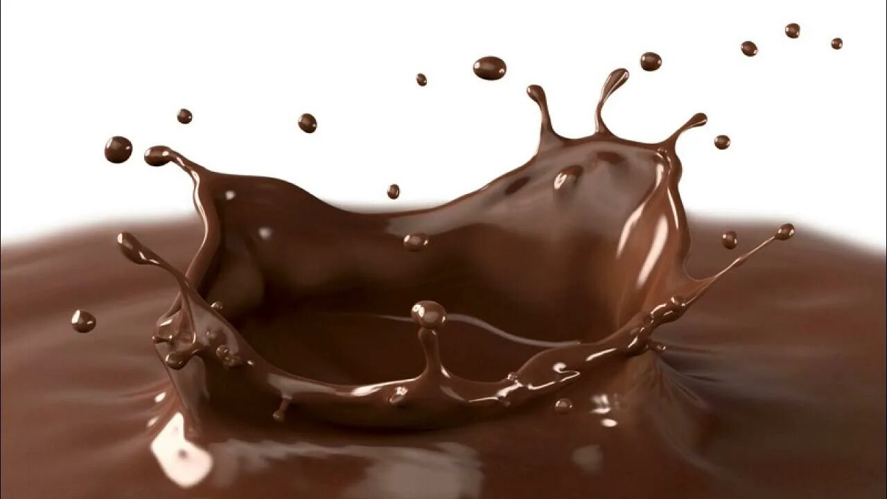 Растаявший шоколад. Жидкий шоколад. Всплеск шоколада. Текучий шоколад. Шоколадный фон.