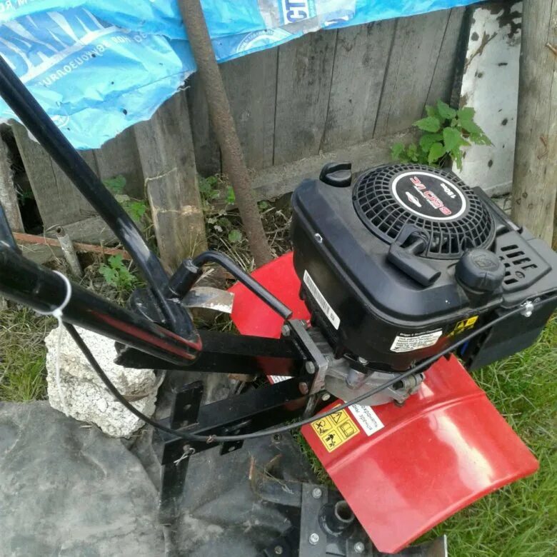 Мотокультиватор тарпан тмз мк. Тарпан культиватор Briggs Stratton. Stratton культиватор Тарпан 03. Мотоблок Тарпан с двигателем Briggs Stratton. Культиватор Тарпан ТМЗ МК 03 С двигателем Briggs Stratton.