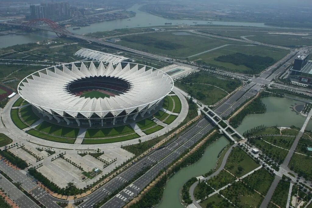 Стадионы китая. Лотус Стэдиум. Стадион сенчури Лотус в Фошане. Стадион в Китае Лотос. Самый большой стадион Китая.