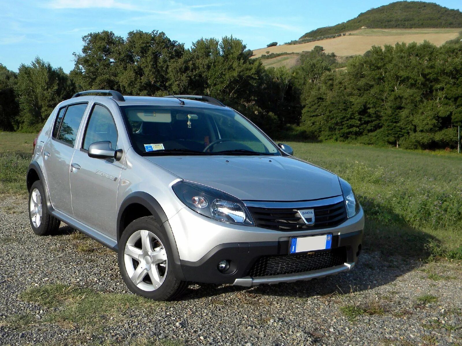 Sandero stepway 2012. Рено Сандеро 2012. Renault Sandero Stepway 2010. Рено степвей 2009. Рено Сандеро степвей базальт.