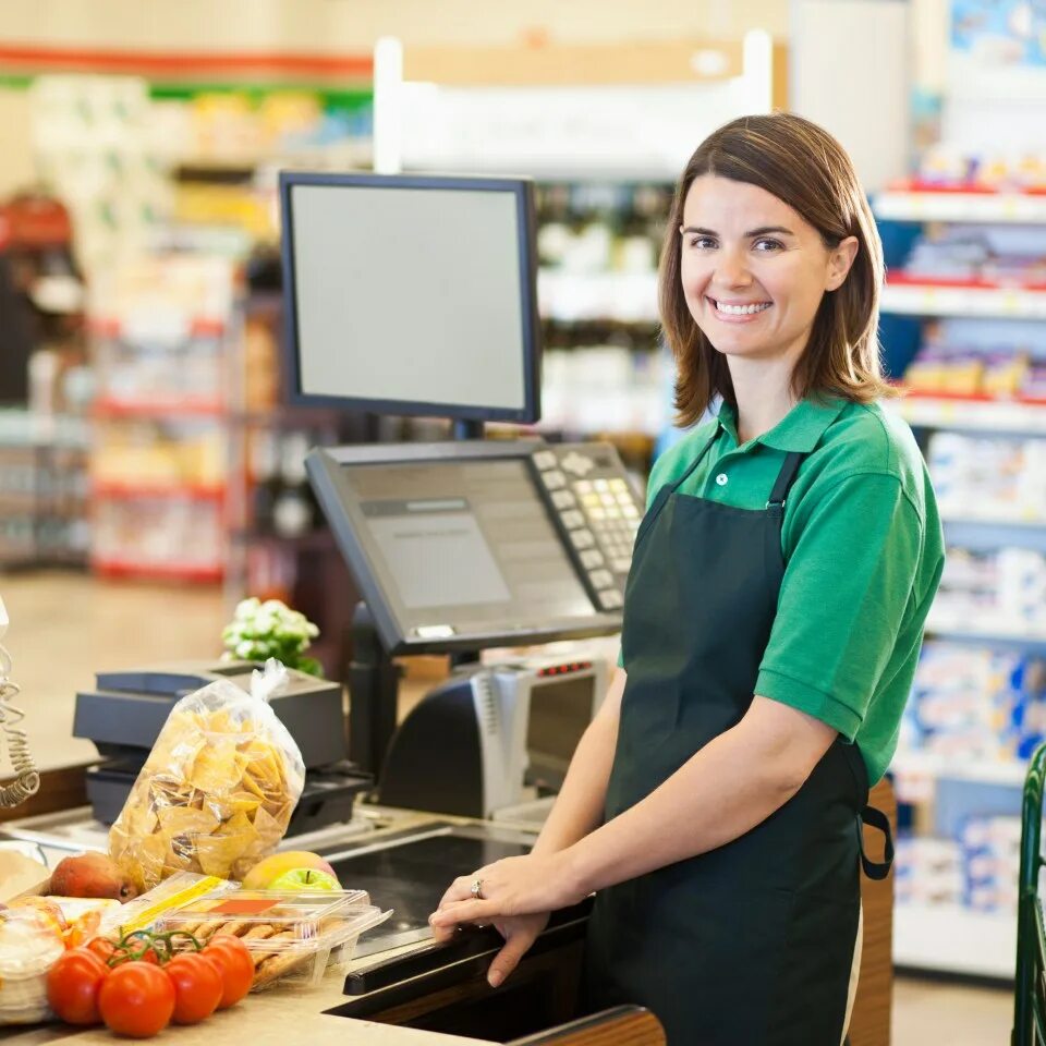 She is a shop assistant. Продавец. Продавец кассир. Продавец в магазине. Кассир в магазине.