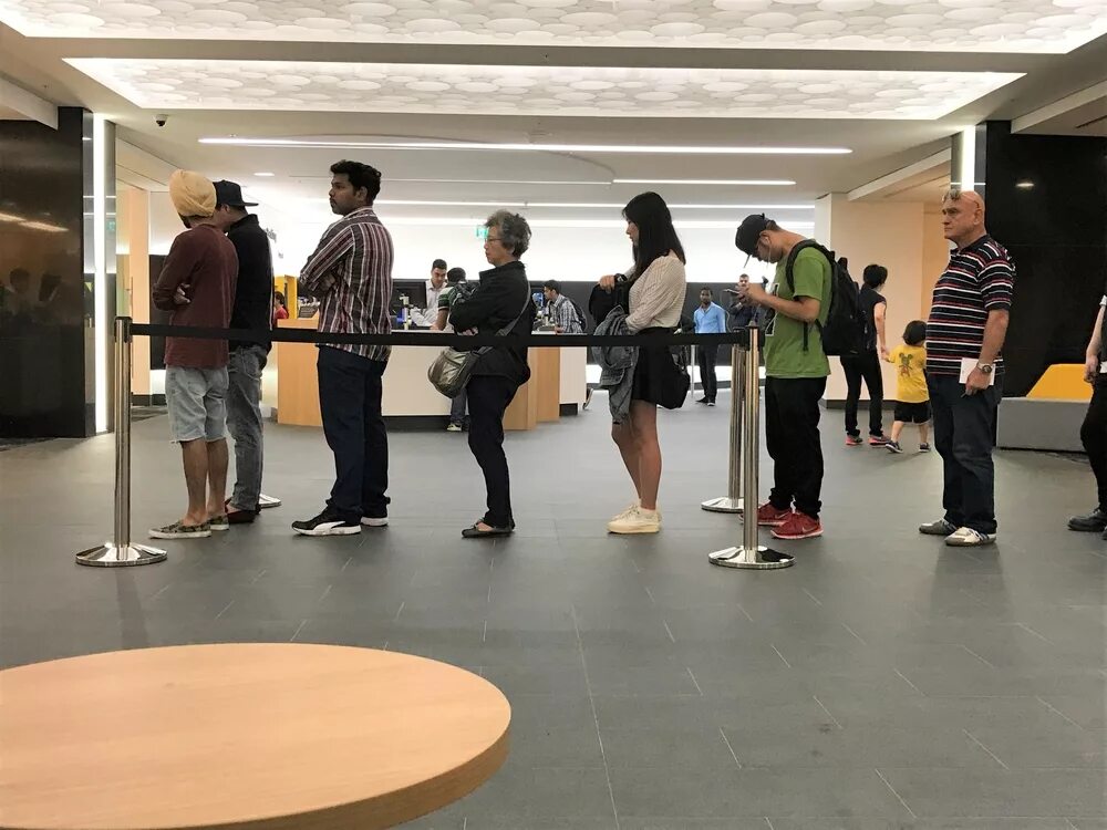 Bank march. Queue in the Bank. Queue for Bank. Queuing at, say, a Bank. People at the Bank.