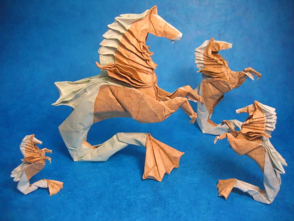 Оригами морской конек. Оригами морской конек из бумаги. Оригами коньки. Морской конек из оригами.
