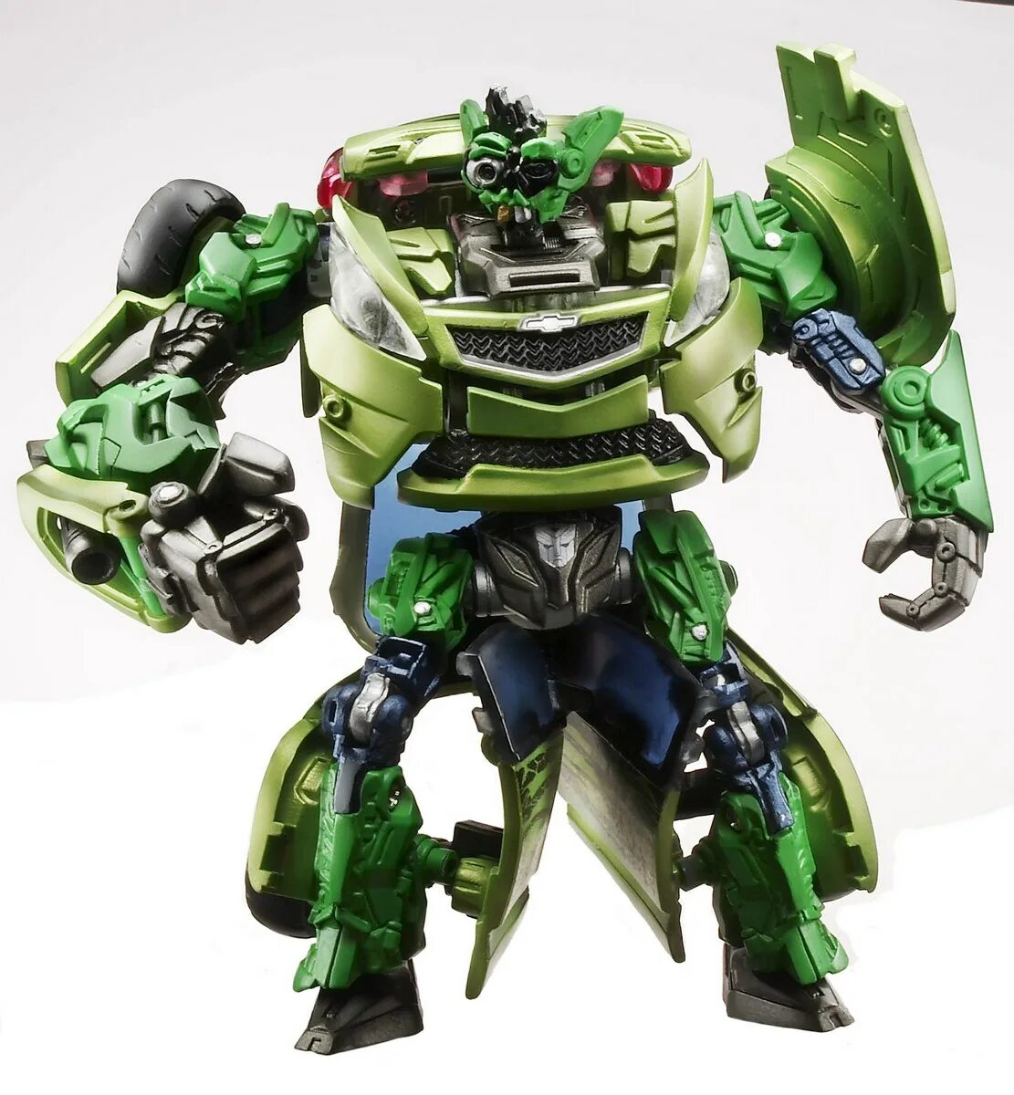 Трансформеры автобот кроссхэйрз. Зеленый трансформер. Гримлок трансформер зеленый. Робот трансформер зеленый. Зеленый трансформер.