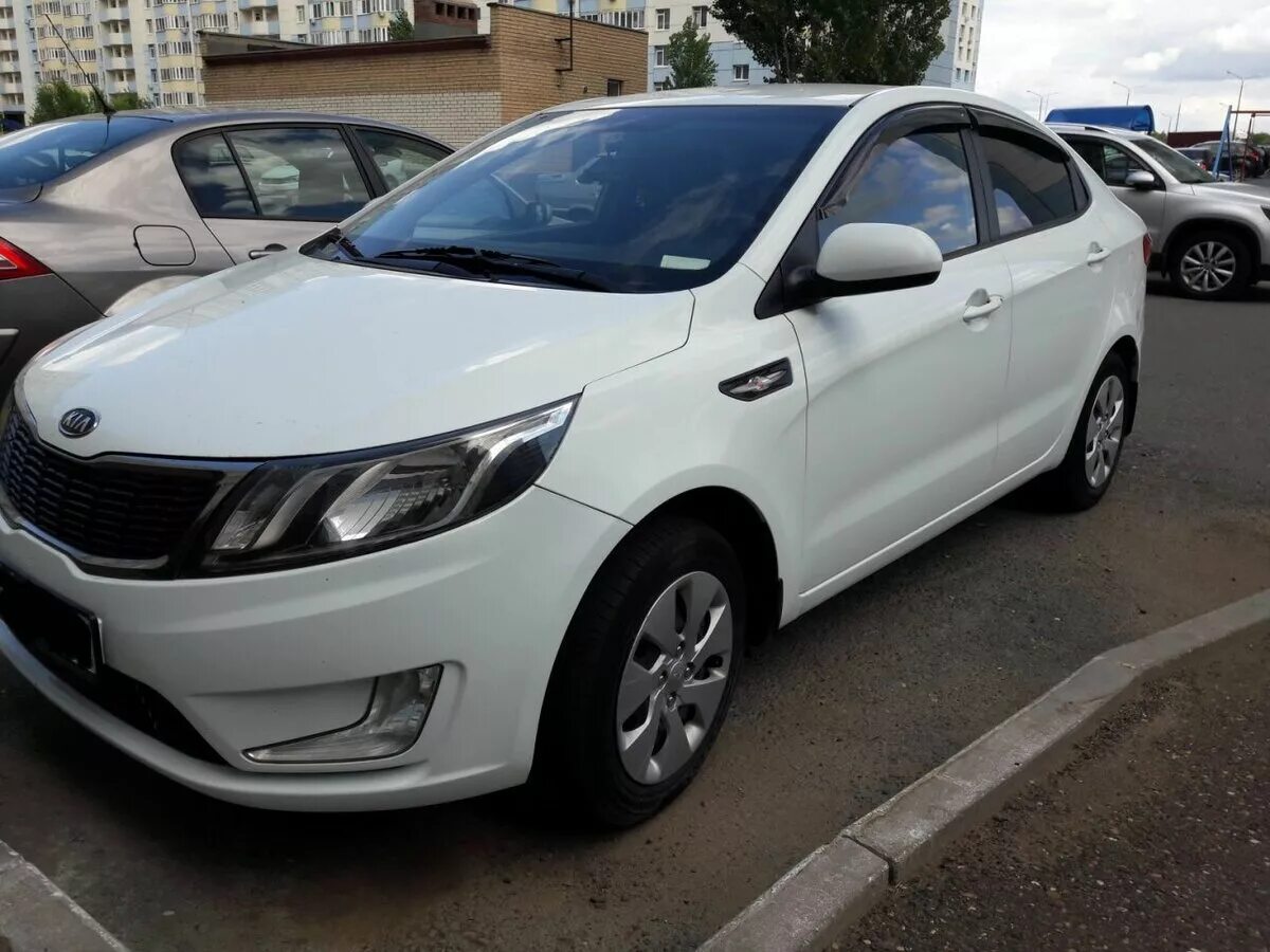 Кия рио 2012 год. Kia Rio 2012. Kia Rio 2012 White. Kia Rio 2012 белый. Киа Рио 2012 седан.