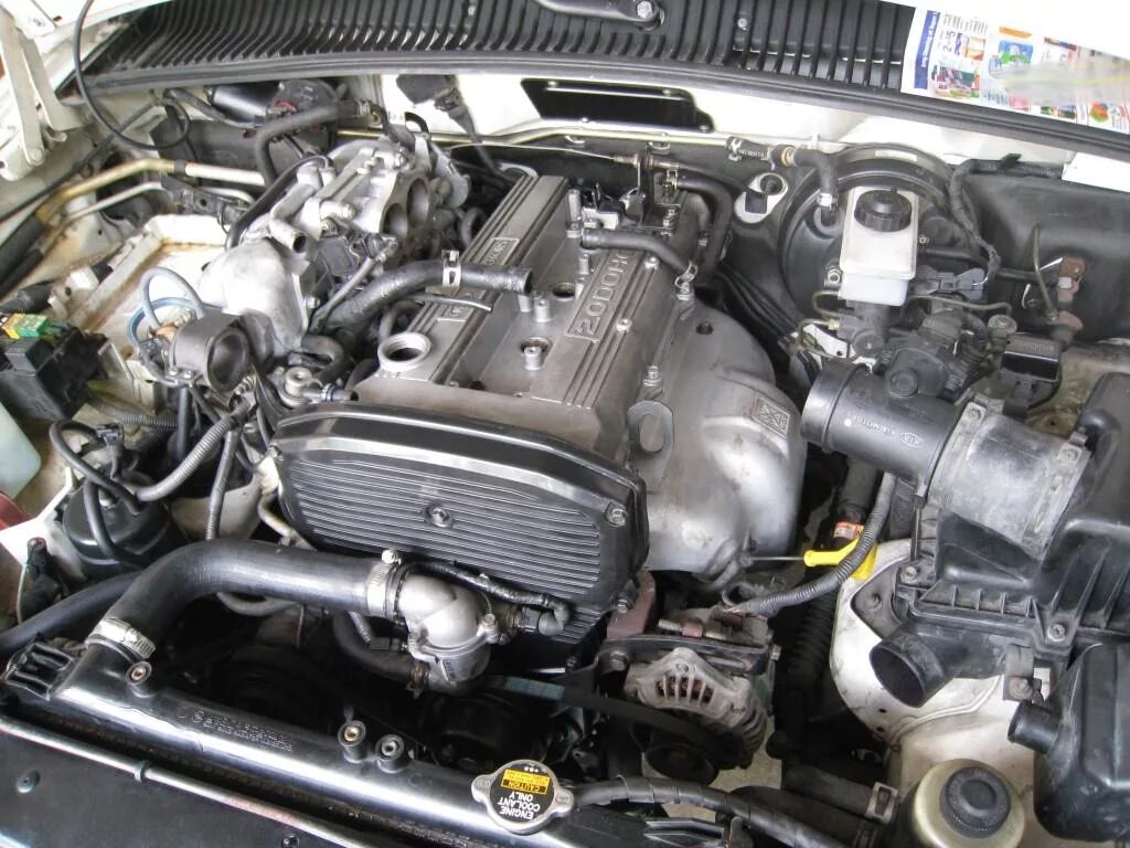 0 fe. Kia sportage 1 мотор. Мотор киа спортейдж 1 2. Двигатель rf 2. 0 16v kia.