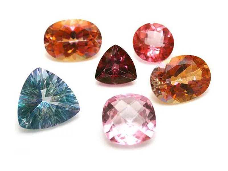 Топаз каких цветов бывает. Topaz камень gemstone. топаз какого цвета бывает. какого цвета бывает топаз полудрагоценный камень. топазы разновидности цвета.