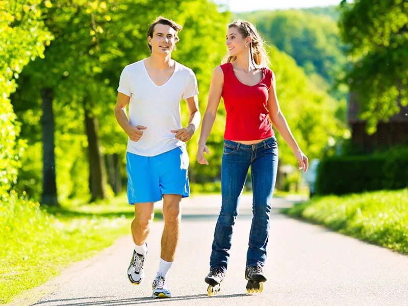 He is doing sport. Sport man and woman. Весна активная пара спорт. Пара резвятся. Sports couple Happy.