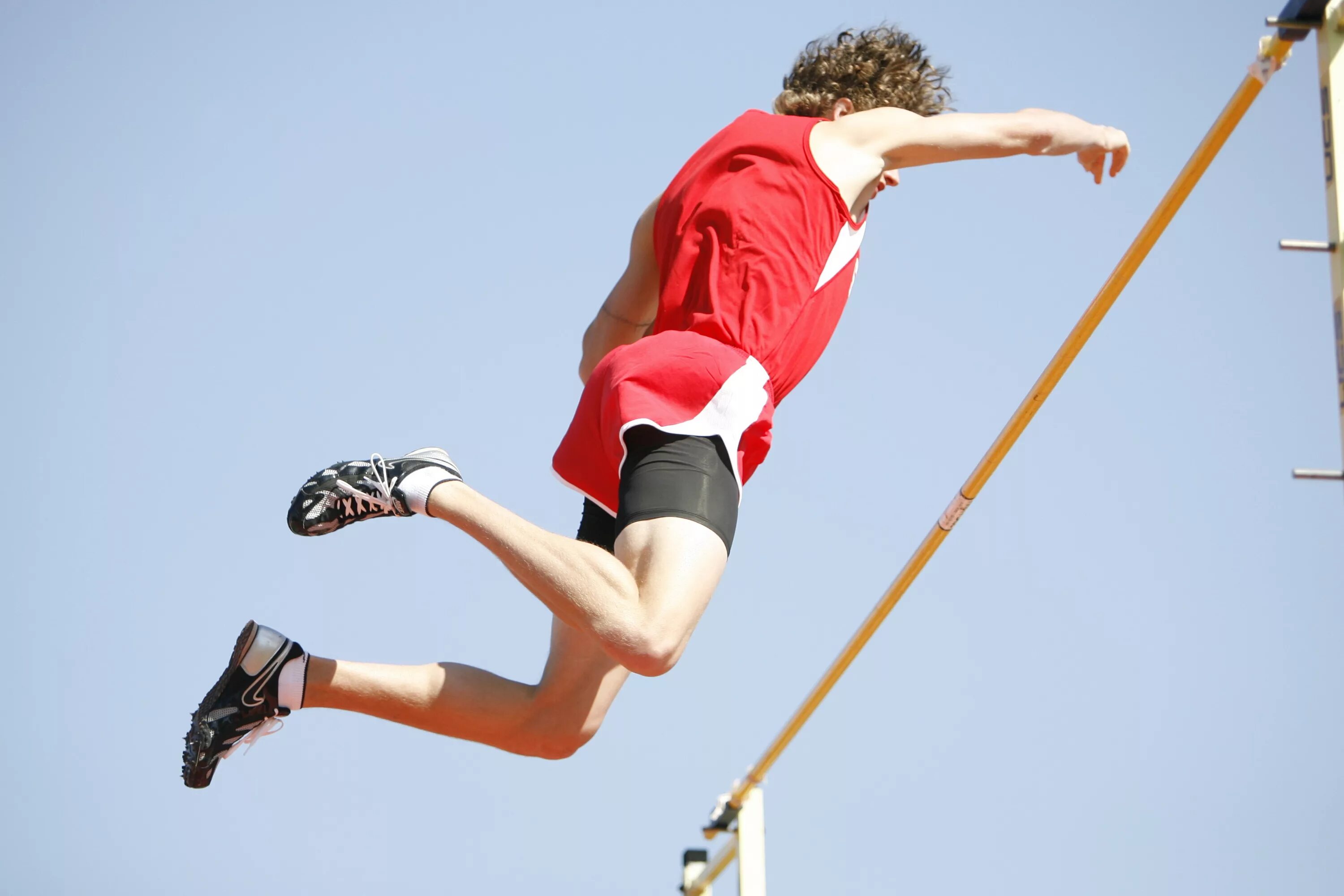 Athletes competitions. Прыжки в высоту. Вертикальные прыжки. В прыжке. Спорт прыжки в высоту.