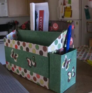 Из коробки в которой