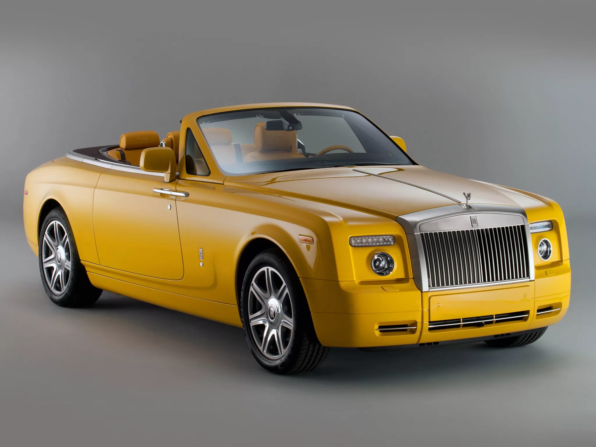 Автомобиль роллс ройс. Rolls Royce Phantom Coupe Drophead 2011. Rolls Royce Phantom Drophead Coupe. Роллс Ройс кабриолет желтый. Rolls-Royce Phantom Drophead Coupe Bijan Edition.