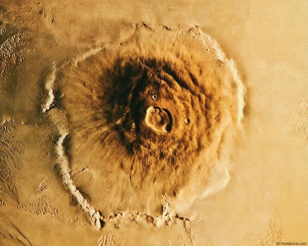 Самая высокая гора в солнечной системе находится. Гора Олимп на Марсе. Марсианский потухший вулкан гора Олимп. Вулкан Олимп на Марсе. Олимпус Монс на Марсе.
