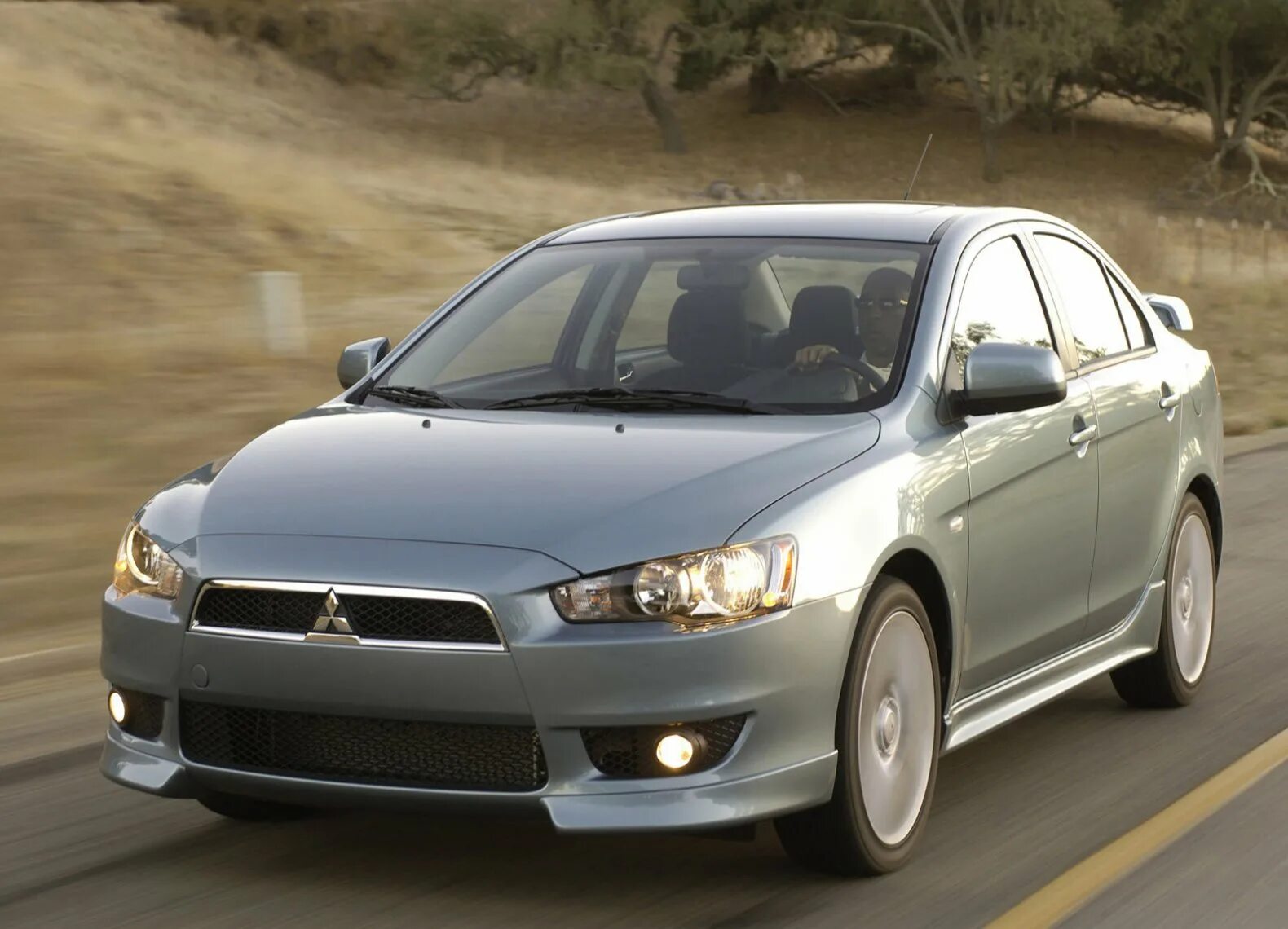 Mitsubishi lancer 10 2008. Mitsubishi Lancer 2008. Митсубиси Лансер 2008. Митсубиси Лансер 10 2008. Митсубиси Lancer 2008.