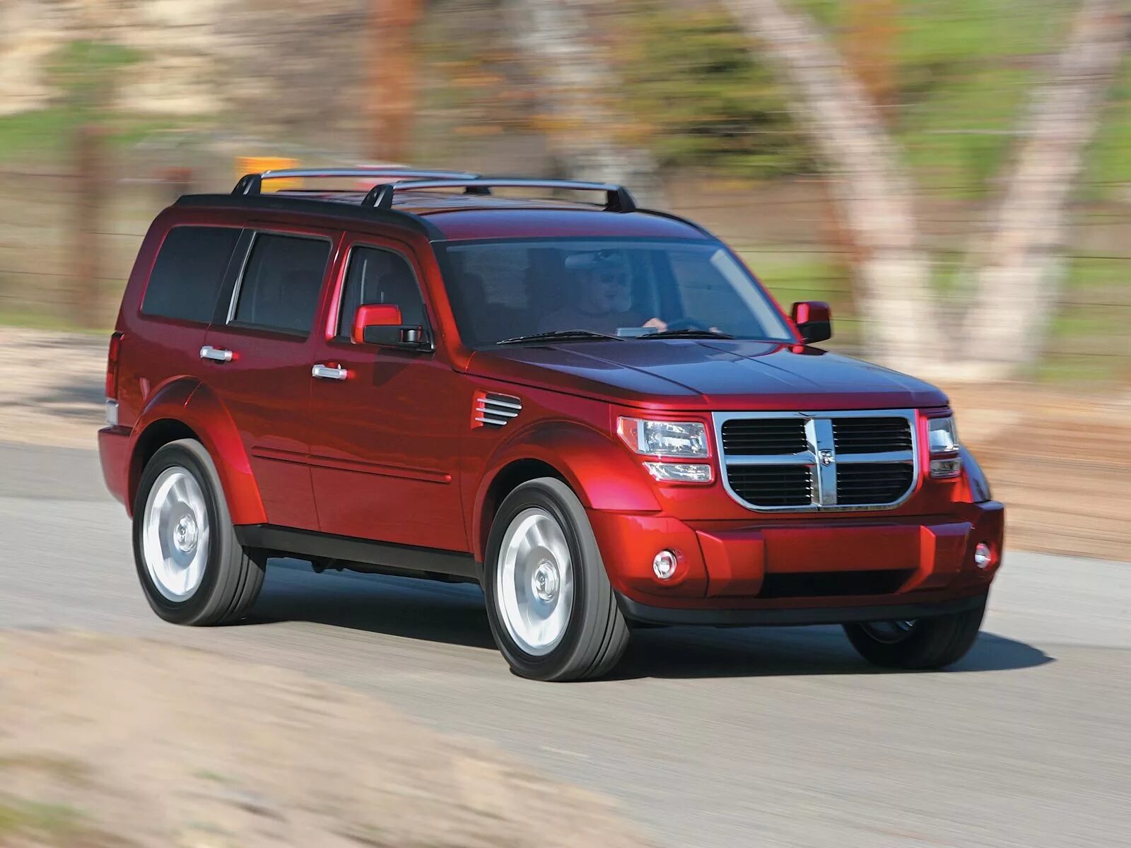 Crd 4x4. Dodge Nitro 2010. Додж нитро 2005. Автомобиль dodge Nitro. Додж интра внедорожник.