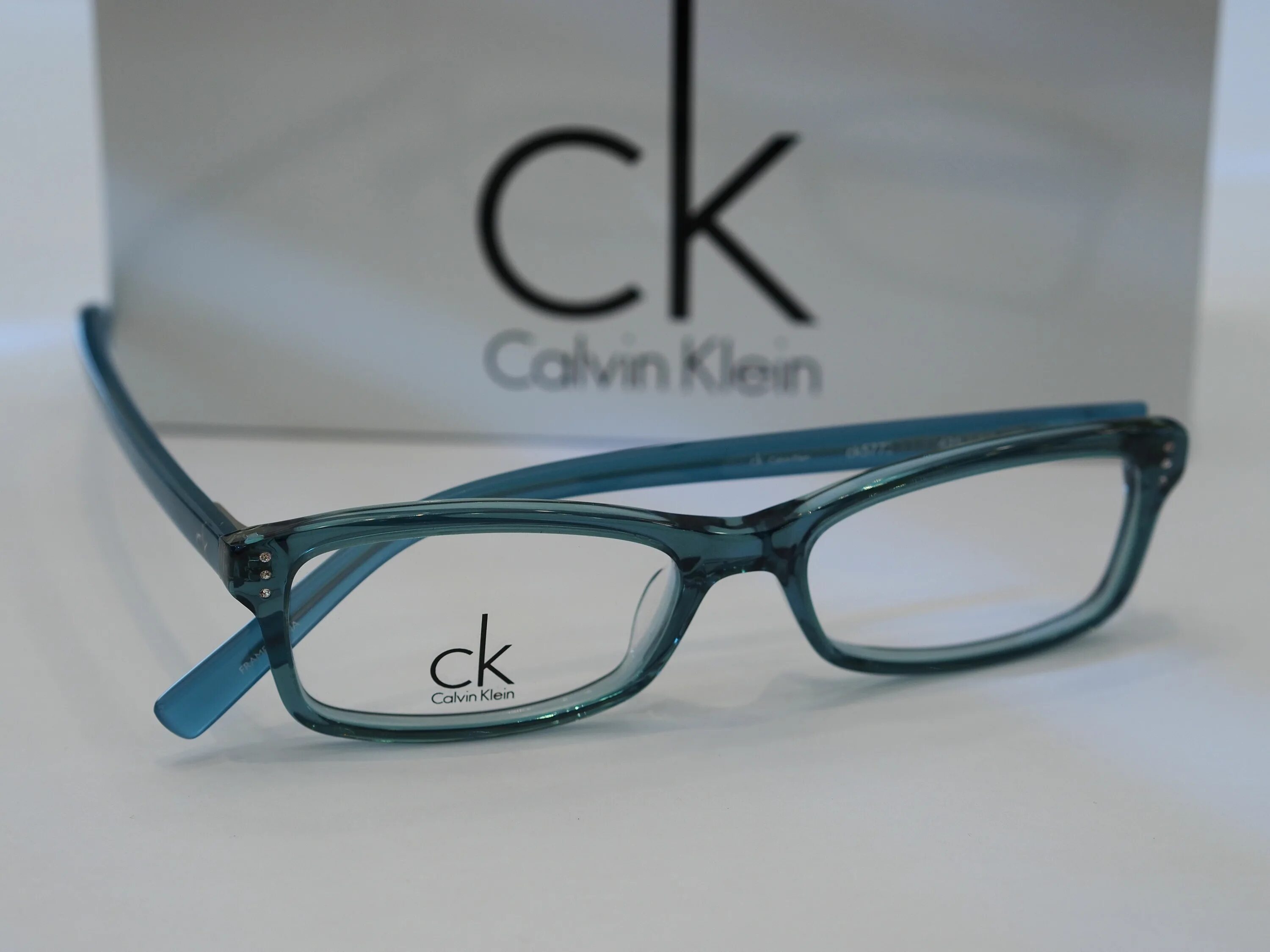 Очки кельвин кляйн. Calvin Klein очки 19543s. 1809 C-4 56 Кельвин Кляйн очки. Очки Calvin Klein sk5904a. Calvin Klein очки синие мужские.