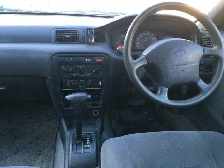 Ниссан санни фб 14. Nissan Sunny fb15 салон. Ниссан fb14 салон. Салон Ниссан Санни fb16 2003.