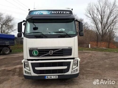 Капот вольво фш. Вольво ФШ 13. Volvo fh13 2011. Вольво ФШ 13 2011. Вольво ФШ 13 2014г.