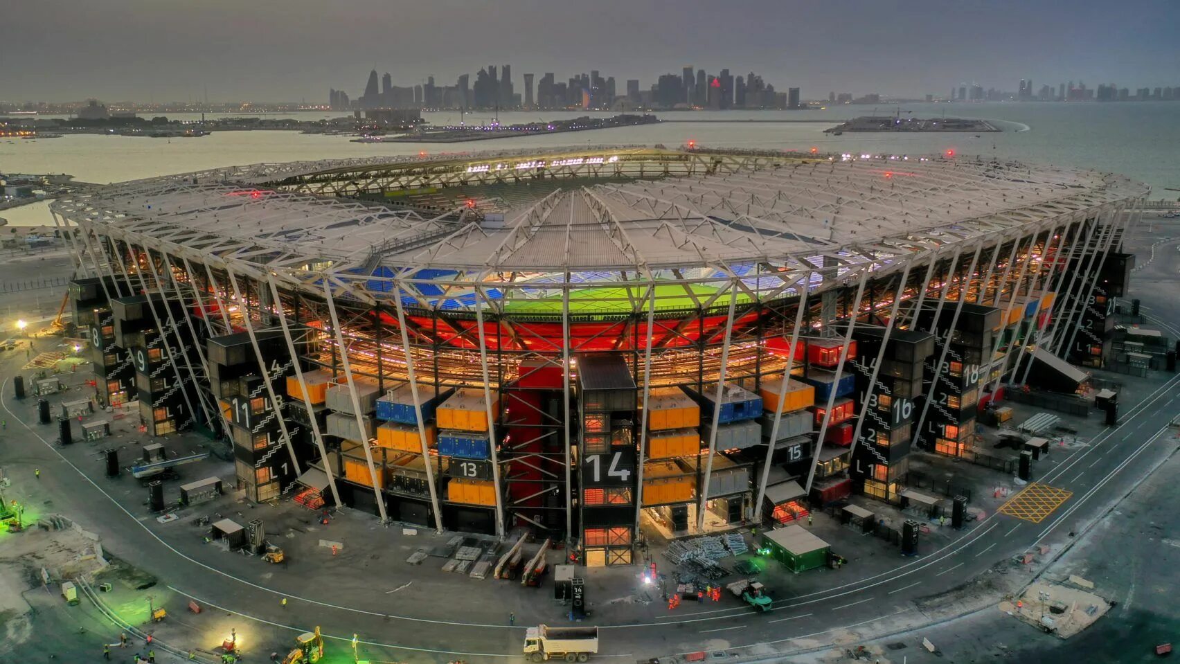 Stadium build. Стадион 974 Катар. Стадион из контейнеров в Катаре. Рас Абу Абуд стадион. Стадион в Катаре 2022 из контейнеров.