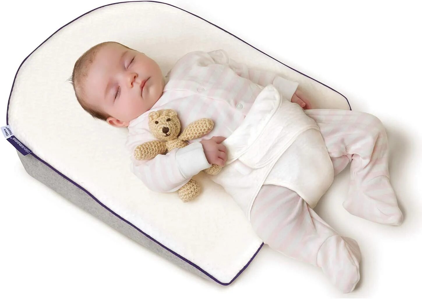Какую подушку ребенку 3. Clevamama подушка позиционер. Позиционер Baby Sleep. Подушка позиционер для новорожденного. Антиколиковая подушка для новорожденных.