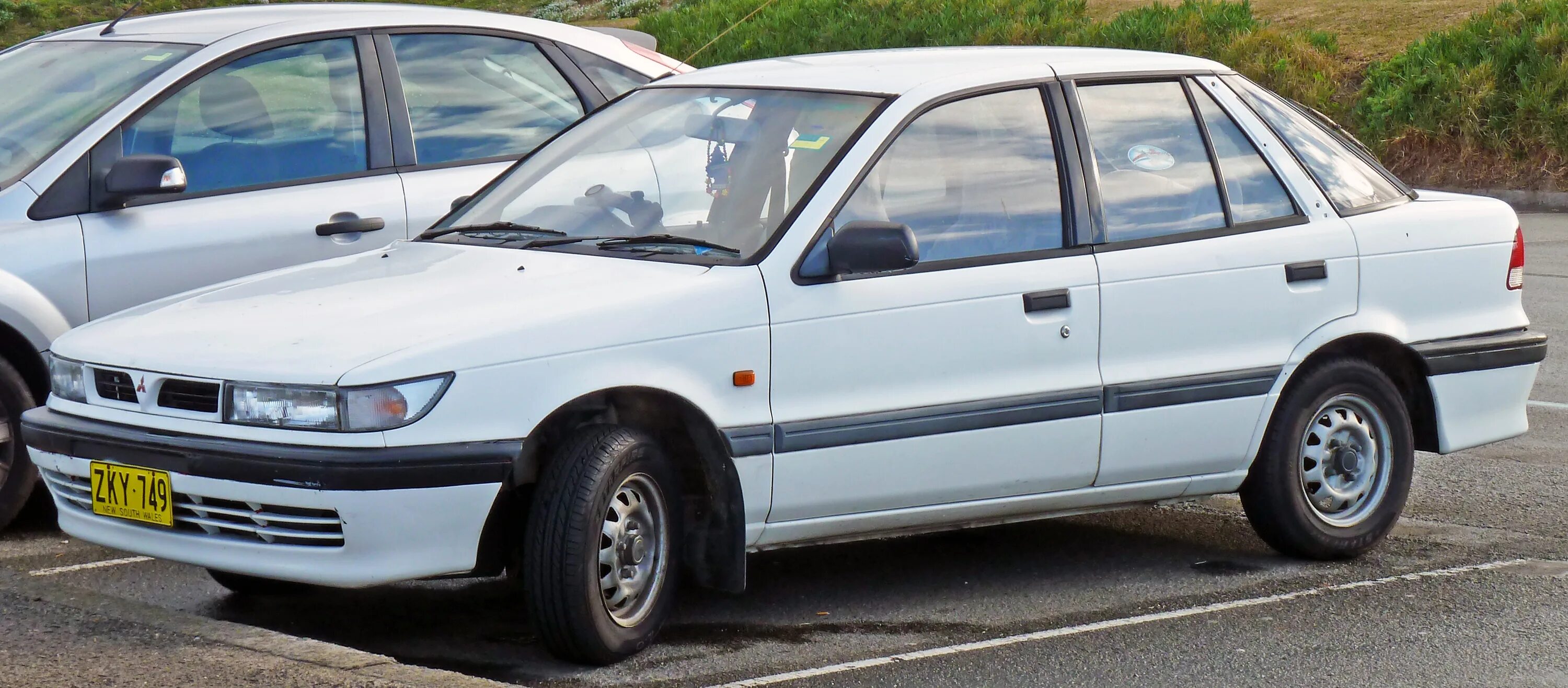 Mitsubishi 1992. Мицубиси Галант 1992. Mitsubishi Lancer 1992. Митсубиси Лансер 1992. Mitsubishi Lancer 4 1992.