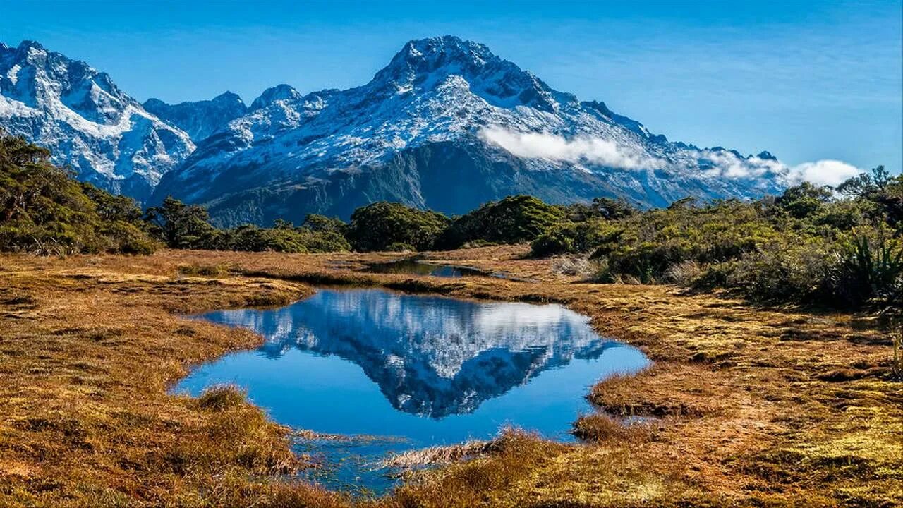 New zealand two islands. Новая Зеландия Южный остров. Горы Южного острова новой Зеландии. Новая Зеландия Южный остров фото. Новая Зеландия (острова новая Зеландия).