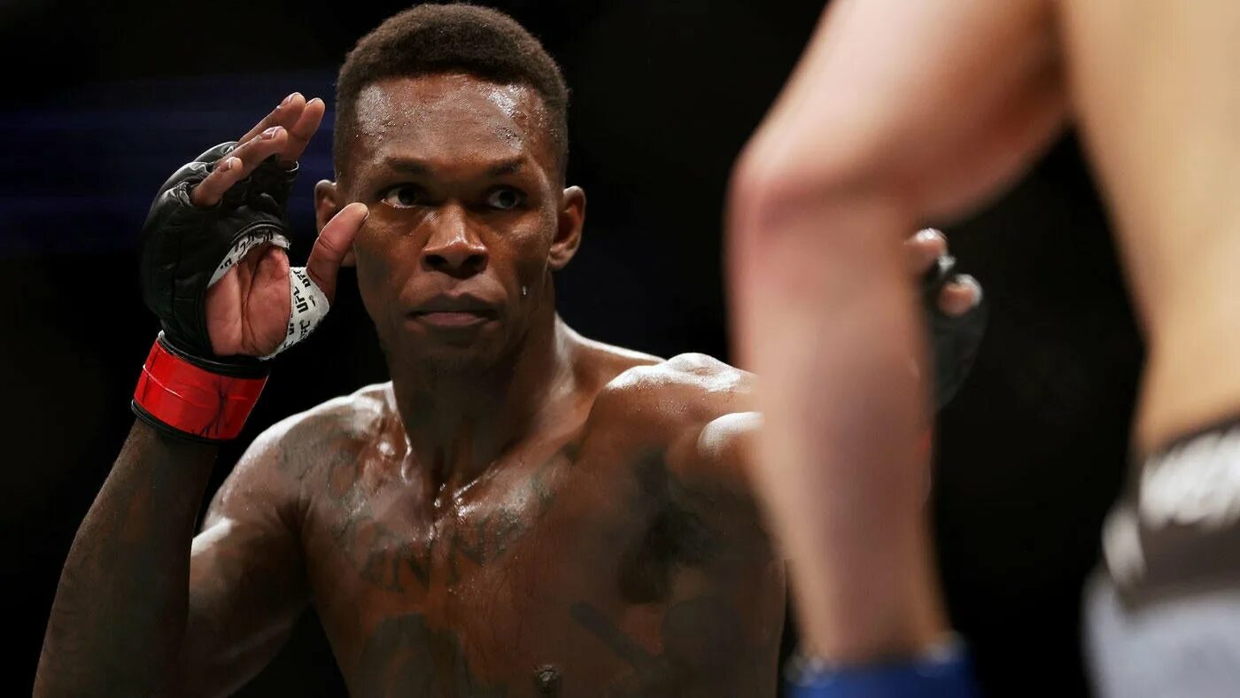 Боец юфс исраэль адесанья. Исраэль адесанья. Исраэль адесанья ufc. Исраэль адесанья ufc. Исраэль адесанья.