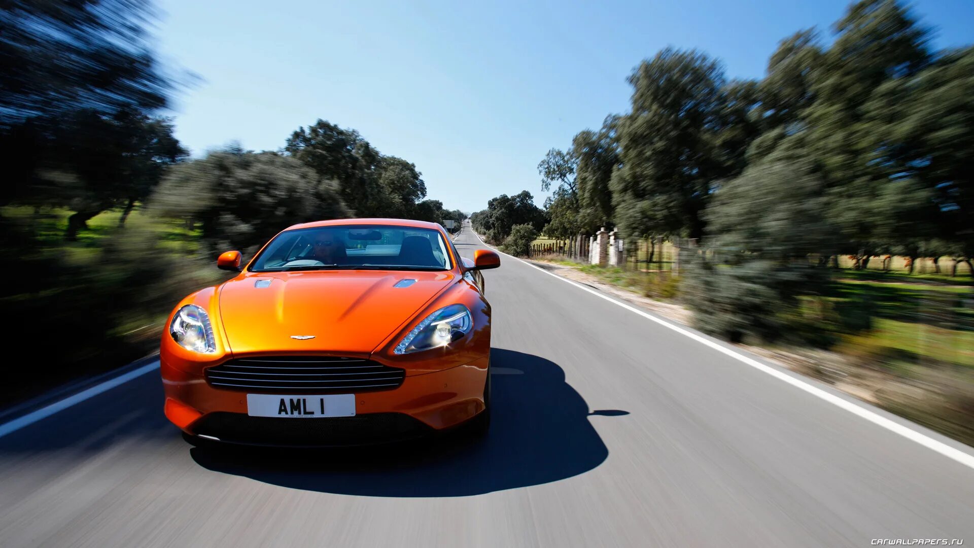 Включи оранжевый автомобиль. Aston Martin Virage 2012. Машина Астин МАРТИНВ купе оранжевая. "Aston Martin" "Virage" "2012" xe.
