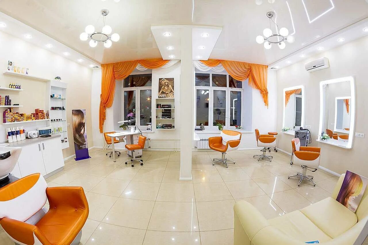 Салон парикмахерская. Салон красоты внутри. Салон красоты парикмахерская. Парикмахерская в оранжевых тонах.