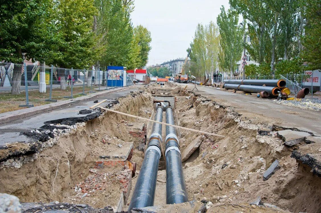 Тепловые сети волгоград. Теплотрасса в городе. Реконструкция тепловой сети. Ремонт теплосетей. Проект теплотрассы.