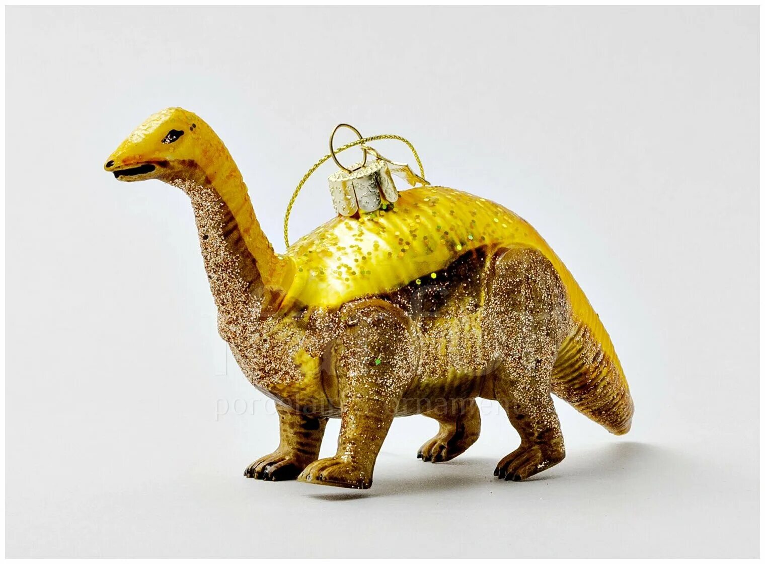 Золотой динозавр. Игрушка золотой динозавр. Динозавров со золотом. Динозаврик золотой. Золотой динозавр 585.