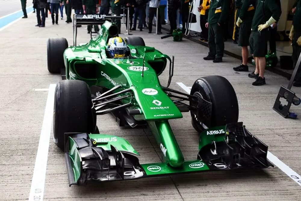 Формула 1 13. Caterham f1 2014. Ф1 команда Катерхем 2014. F1 2014 Болиды. Катерхэм ф1.