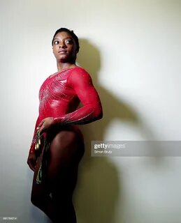 Summer Olympics: Portrait of Team USA gymnast Simone Biles posing with 4 Go...